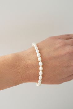 Our Freshwater Pearl Bracelet is made with real freshwater pearls and gold filled jump rings and closure. This timeless bracelet pairs well with stackable bracelets or as a stand alone piece! Pearls are always classic, and you'll love this piece! Timeless Bracelet, Website Photos, Cute Bracelet, Pearl Bracelets, Jewelry Cute, Bracelet Minimalist, Freshwater Pearl Bracelet, Stackable Bracelets, Cute Bracelets