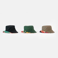 Khaki/ Million M Pattern Mid-weight reversible Bucket hat with a solid color Side and the MIFLAND Million M's Print on the other side One Size Fits All - Fits from 7-73/4 (Hats Sizes) Reversible Flat Brim Bucket Hat For Outdoor, Reversible Bucket Hat For Outdoor, Reversible Outdoor Bucket Hat With Flat Brim, Reversible Multicolor Brimmed Hat, Multicolor Reversible Cap, Multicolor Reversible Hats For Outdoor, Green Reversible Bucket Hat For Outdoor, Reversible Flat Brim Bucket Hat, Green Reversible Sun Hat With Curved Brim