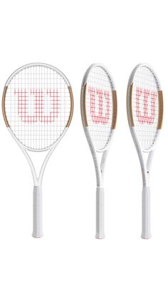 three tennis racquets with the letters u and w on each racket