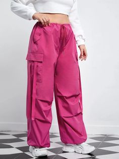 Our Flap Pocket Side Drawstring Waist Pants, you get the perfect fusion of style and comfort. Featuring flap pockets on the sides and a drawstring waist, these pants offer practicality and a modern design. The drawstring waist ensures a customized fit, while the high-quality materials provide durability and a soft feel. Whether lounging at home or going for a casual outing, these pants are a stylish choice. Details: Type: Cargo Pants Closure Type: Drawstring Waist Details: Drawstring, Pocket Wai Pink Drawstring Sweatpants For Streetwear, Trendy Pink Drawstring Pants, Solid Color Straight Cargo Pants With Drawstring, Solid Straight Cargo Pants With Drawstring, Spring Drawstring Cargo Pants, Ankle-length, Spring Ankle-length Cargo Pants With Drawstring, Baggy Ankle-length Cargo Pants With Drawstring, Utility Bottoms With Drawstring And Loose Fit, Utility Bottoms With Drawstring And Loosely Fitted Hips