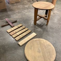 several pieces of wood sitting on the floor