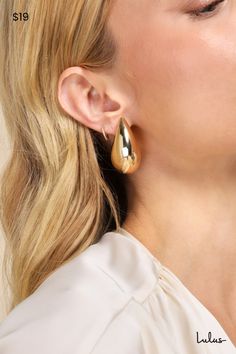 Your exceptional taste is sure to wow with accessories like the Lulus Bold Expression Gold Chunky Teardrop Statement Earrings! Shiny, gold-toned metal shapes these eye-catching statement earrings that have a puffy, teardrop-shaped silhouette with a stunning oversized profile. Post backs. Earrings measure 1. 75" long and 1" wide. Man Made Materials. Imported. Lulus | Bold Expression Gold Chunky Teardrop Statement Earrings. Bold Statement Jewelry, Earrings Teardrop, Lulu Fashion, Accessories Jewelry Earrings, Personal Marketing, Wedding Shop, Gold Tone Metal, Statement Jewelry, Floral Watercolor