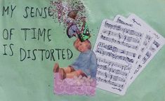 a piece of paper with an image of a baby on it and some music notes