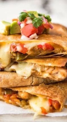 three quesadillas stacked on top of each other