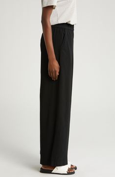 Updated in soft and drapey Tencel® lyocell, these pull-on pants easily take you from work to play with an on-trend wide-leg silhouette. 30" inseam; 11" front rise (size Small) Elastic waist 97% Tencel lyocell, 3% spandex Tencel lyocell is a sustainably produced fiber made with closed-loop processing Machine wash, tumble dry Imported Full-length Viscose Pants For Workwear, Full-length Viscose Workwear Pants, Viscose Full-length Workwear Pants, Viscose Wide Leg Pants For Daywear, Black Viscose Wide Leg Pants, Full Length Rayon Bottoms For Work, Effortless Wide Leg Workwear Pants, Relaxed Fit Wide Leg Pants For Work, Black Wide Leg Viscose Pants