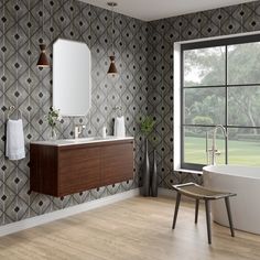 a bath room with a tub a sink and a large window next to a wall