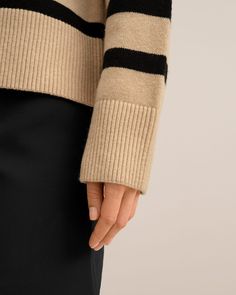 100% merino wool, warm, soft, and skin-friendly Turtleneck Classic stripes Relaxed fit {"d_list":"100% merino wool, warm, soft, and skin-friendly##Turtleneck## Classic stripes## Relaxed fit","d_text":"Walk the line of classic and comfort this season in the Tarra Stripe Sweater, a timeless turtleneck in a deliciously soft thick knitted wool. Designed in a loose-fitting silhouette ideal for layering in cooler weather, the spiral knitting on the collar, hem and cuffs make this timeless sweater feel Elegant Striped Winter Sweater, Striped Cashmere Winter Sweater, Winter Striped Cashmere Sweater, Striped Cashmere Sweater For Winter, Timeless Sweater, School Wear, Walk The Line, The Spiral, Festival Wedding