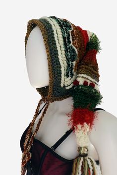 Unique crochet elf hood in brown, green, red & white earth tones and tasseled bottom.  Created from reclaimed yarns and fibers.1 of 1 Crochet Elf Hood, Goblincore Crochet, Earthy Crochet, Denim Cuff Bracelet, Crochet Elf, Crochet Hood, Denim Bucket Hat, Upcycle Shirt, Crochet Size