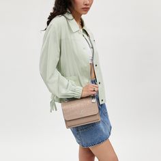 Our Klare Crossbody is a true day-to-night favorite with a chain strap that can be worn three ways: crossbody long or doubled up on the shoulder. Crafted of crocodile-embossed leather this bag has several multifunction pockets to keep your phone small wallet and other essentials (like keys and lip balm) organized. It’s the perfect leather crossbody bag for women to show up to your next outing in style. Feminine Crossbody Shoulder Bag For Spring, Versatile Spring Shoulder Bag For Day Out, Feminine Spring Crossbody Shoulder Bag, Chic Fall Shoulder Bag, Spring Evening Bags, Chic Bags For Spring Day Out, Chic Bags For Day Out In Spring, Chic Spring Bags For Day Out, Beige Evening Bags For Fall