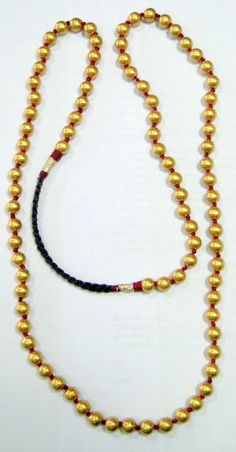 vintage tribal 22 k gold and wax filled round beads necklace from Madurai south India. As worn by all Chettiar(caste) people, Highly sort after piece for any serious collectors will look fabulous with a modern crisp white shirt. Total length-40 inches, we can adjust the length, size of beads- 9 mm, total weight-53 grams, Material -22-carat gold and wax filled. 22k Gold Round Temple Necklace For Puja, Traditional Adjustable Single Strand Beaded Necklaces, Traditional Adjustable Single Strand Beaded Necklace, Festive Temple Necklace With Round Beads For Rituals, Round Necklaces For Puja And Festivals, Traditional Ceremonial Necklace With Round Beads, Festival Temple Necklace With Tilla And Round Beads, Temple Necklace With Tilla And Round Beads For Festivals, Traditional Temple Necklace With Round Beads For Festivals