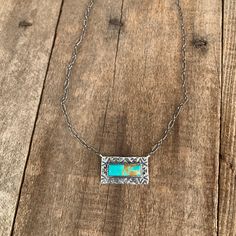 "This is a custom handmade Sterling Silver & turquoise necklace. It is adorned with Aztec stamping around the perimeter of the stone. It measures 1 1/8\" from top to bottom x 3/8\" wide. COLOR MAY VARY. PLEASE if you would like a certain turquoise color (bluer, greener in color) specify in the notes on order." Turquoise Bar Necklace, Turquoise Bar, Faith Jewelry, Turquoise Color, Handmade Sterling Silver, Bar Necklace, Turquoise Necklace, Cross Necklace, Blue Color