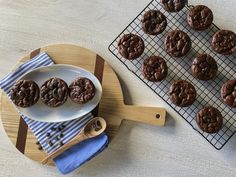 chocolate cookies on a cooling rack next to a plate