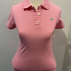 Rib-Knit Collar & Cuff Trim Slim Fit Designed With 3 Shimmery Pearlized Buttons Embroidered A87 Logo Bottom Side Slits 95% Cotton 5% Spandex 2000s Polo Shirt Outfit, Pink Polo, Pink Y2k Short Sleeve T-shirt, Fitted Pink Polo Collar T-shirt, Pink Polo Shirt, Junior Shirts, Aeropostale Shirts, Pink Cotton Polo Collar T-shirt, Polo Shirt Colors