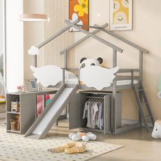 a child's bedroom with a slide and bunk bed