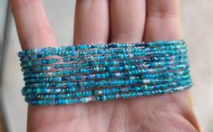 This listing is for ten blue aqua mix seed bead bracelets. They are stackable and are perfect for the beach, your boho outfit, your minimalist look. This dainty bracelet set would be a great gift for her, for a friend and for family members! Pick your length! Blue Heishi Beads Bracelet With Tiny Beads, Blue Multi-strand Beaded Bracelets With Tiny Beads, Turquoise Stretch Bracelet With Tiny Beads For Beach, Blue Multi-strand Bracelets With Tiny Beads, Blue Multi-strand Bracelet With Tiny Beads, Blue Tiny Beads Stretch Bracelet For Beach, Blue Stretch Bracelet With Tiny Beads For Beach, Blue Multi-strand Beaded Bracelets For Beach, Blue Beach Bracelet With Tiny Beads