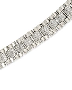 Add elegant details to your favorite looks by wearing this CZ accent watch band chain bracelet! This gorgeous piece is accented with CZ stones and is available in gold and silver tones. Materials: 14K gold or rhodium plated stainless steel, cubic zirconia Features: Measures 7" length, 0.45" width, 1mm CZ stones, Lead & Nickel free, foldover single-channel clasp Modern Metal Bracelets With Diamond Accents, Luxury Metal Bracelets With Bling, Formal Chain Link Jewelry With Cubic Zirconia, Silver Cubic Zirconia Chain Tennis Bracelet, Elegant White Gold Diamond Watch With Bling, Elegant White Gold Embellished Diamond Watch, Formal White Gold Metal Chain Bracelet, Formal White Gold Chain Bracelet, Cubic Zirconia Jubilee Link Bracelet