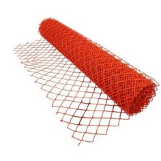 a roll of orange colored wire mesh on white background