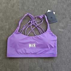 Raw Gear Women's Purple Cross Back Sling Padded Sports Bra Size Large This Raw Gear Women's Purple Cross Back Sling Padded Sports Bra Is Perfect For Any Active Woman. The Bra Features A Crossback Strap Type And Padded Cups For Extra Support During Any Workout. The Purple Color Adds A Stylish Touch To Your Activewear. The Sports Bra Is Designed For Women And Is Ideal For Any Occasion, Whether You're Hitting The Gym Or Going For A Jog. The Bra Is Made By Raw Gear, A Trusted Brand In Athletic Cloth Sports Tank Top With Adjustable Straps And Strappy Back, Summer Strappy Sports Bra For Yoga, Strappy Gym Bra With Adjustable Straps, Summer Strappy Sports Bra For Gym, Strappy Workout Bra With Adjustable Straps, Sports Bra For Gym In Summer, Workout Strappy Bra With Adjustable Straps, Summer Activewear With Adjustable Straps And Cross Back, Summer Activewear With Adjustable Cross-back Straps