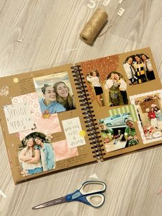 a scrapbook with pictures and scissors on a table next to twine spools