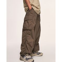 Similar cargo pants:   Summer Wide-Leg Beige Cargo Pants Get Down to Business with Stylish Functionality! 👔🔧 Discover the Power of Cargo Pants, Work Hard, Dress Smart! 🔥👖 Elevate Your Style Game with Durable Cargo Pants. From the Workshop to the Runway! 🛠️🌟 Unleashing the Style Potential of Cargo Pants Featuring multiple pockets and reinforced stitching, our cargo pants offer ample storage for your tools and essentials, ensuring easy accessibility and convenience. The adjustable waistband Men Loose Fit Style, Parachute Baggy Pants Outfit, Men’s Baggy Cargo Pants, Where To Buy Parachute Pants, Baggy Clothing Men, Parachute Pants Outfit Men, Parachute Pants Mens, Earthtone Outfits, Parachute Pants Men