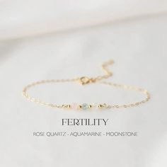 Fertility Crystal Healing Bracelet, gold jewellery designed as a supportive gift for IVF or fertility journeys - Pregnancy Protection Gift This beautiful bracelet features rose quartz, aquamarine and moonstone crystals in 4mm. It is a wonderful gift for new mothers (baby showers, baby announcements, birthdays or any occasion) and the perfect gift for women who are trying to get pregnant. ✦ DETAILS ✦ Bracelet: Natural gems - 4 mm rose quartz, aquamarine, moonstone Closing mode: spring ring Size: 6 inches (15 cm) Adjustable length: includes 1 inch (2.5 cm) extension chain Metal Type: Zinc Alloy Rose Quartz Stone Rose quartz is known as the stone of love and fertility. It is believed to enhance fertility, promote emotional healing, and create a nurturing environment for conception. It is also Adjustable Healing Jewelry Gift, Adjustable Healing Jewelry As A Gift, Minimalist Crystal Bracelet With Birthstone For Gift, Gold Crystal Bracelet For May Birthstone Gift, Minimalist Birthstone Crystal Bracelet For Gift, 14k Gold Filled Birthstone Bracelets As A Gift, Mother's Day Gift Gold Crystal Bracelet, Gold Crystal Birthstone Bracelet As Gift, Gold Bracelet For May Birthstone Gift