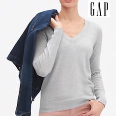 Gap Women's V-Neck Pullover Soft Knit Light Sweater Top In Grey Straight Silhouette With An Easy Fit. Hits Below The Hips. Soft Knit. Long Sleeves With Rubbed Cuffs, Hem. Ribbed V-Neck. #931205 100% Cotton. Machine Wash. Armpit To Armpit Xs: 18.5"; S: 19" Total Length Xs; 24"; S: 24.5" Classic Gap Tops For Fall, Classic Winter Tops From Gap, Classic Gap Tops For Winter, Gap V-neck Fall Sweater, Casual Gap V-neck Sweater, Casual V-neck Sweater By Gap, Gap Long Sleeve Knit Tops, Gap Tops For Winter Layering, Gap V-neck Tops For Fall