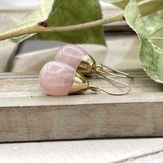 Delicate dangle earrings made with gorgeous teardrop shaped Rose Quartz gemstones.                                  These earrings are so unique, they will lend your look a touch of elegance.  The Rose Quartz teardrop is about 0.9" ( 23 mm ) long and the largest part of the teardrop is about 0.53" ( 13 mm ) wide. These earrings can be made with 14 K gold filled ear wires or lever backs ( as shown in the pictures ) and the earrings full length is about 1.4" ( 35 mm ). Rose Quartz is the stone of Teardrop Crystal Earrings Gift, Teardrop Crystal Earrings For Pierced Ears Gift, Adjustable Teardrop Pendant Earrings As Gift, Teardrop Crystal Earrings With Ear Wire As Gift, Long Drop Gemstone Teardrop Earrings Gift, Gift Single Long Drop Teardrop Earring, Pink Teardrop Earrings With Natural Stones, Teardrop Earrings With Natural Stones For Gift, Teardrop Natural Stone Earrings For Gift