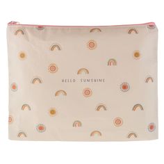 the hello sunshine cosmetic bag in pink with rainbows and sun on it, is shown