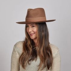 Jawa | Womens Wide Brim Felt Fedora Hat combines bold outback style with sophisticated detailing. The frayed twill cotton trim and leather string cord overlay give this 3 1/2" brim hat a unique, rugged appeal perfect for outdoor adventures. Material: Midweight 100% Firm Felt Australian Wool Shape: Outback Trim: 2” Frayed Twill Cotton Band with Leather String Cord Overlay Brim Size: 3 1/2" Crown Height: 4 1/4" Sweatband: AHM Velcro Imported Western Style Brown Wide Brim Boater Hat, Brown Wide Brim Western Boater Hat, Brown Western Boater Hat With Wide Brim, Brown Fedora With Flat Crown For Ranch, Fall Brimmed Panama Hat For Rodeo, Brown Flat Brim Panama Hat For Ranch, Brown Wide Brim Panama Hat For Ranch, Brown Panama Hat With Flat Brim, Brown Fedora For Ranch