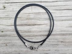 Leather necklace cord/2.0mm black leather cord chain necklace/choker cord/black leather necklace with stainless steel clasps This cord is made with 2mm wide weaved black faux leather (soft weaved polyester) and hypoallergenic kitchen-grade 304 stainless steel. It is tender and smooth with the lobster clasp about 12mm long and the end loop circle about 5mm round. This cord will allow pendant loops/ bails that are more than 5mm long go through. If your pendant loop/bail is very small (the longest Minimalist Black Leather Necklace, Black Leather Jewelry With Lobster Clasp, Black Leather Jewelry With Adjustable Cord, Black Waxed Cord Jewelry For Everyday Use, Black Leather Choker Gift, Black Leather Necklace, Diy Collier, Agate Pendant Necklace, Purple Pearl