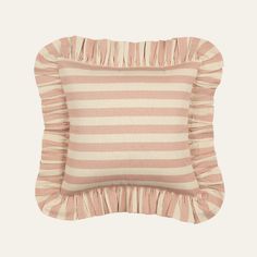 a pink and white striped pillow with ruffled edges