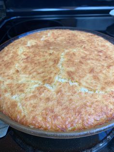 a baked pie sitting on top of a stove