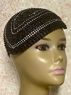 Simple, yet elegant. Black Beaded Fascinator half hat trimmed with rhinestones, and hat pin. The hat pin is for decorative purposes only. The hat is affixed to the head via a hatstring. The hat measures approximately 9.75 in X 6.75 inches at its widest parts. PLEASE NOTE All items for Free Shipping will be shipped via USPS First Class Mail. Gifts for mom, sister, wife, or yourself. Elegant Bead Cap Headband, Elegant Headband Fascinator, One Size Fits Most, Elegant Fascinator Headband One Size, Elegant Headband Fascinator, One Size, Elegant Headband Fascinator One Size Fits Most, Embellished Adjustable Headpieces For Evening, Gatsby Style Headband Hat For Evening, Elegant Rhinestone Headband For Party, Gatsby Style Evening Mini Hat Headband