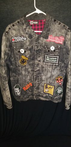 denim jacket customized with 90's & classic rock patches hand sewn on, studs and a large Led Zeppelin back patch Distressed Denim Jacket For Punk Streetwear, Punk Distressed Denim Jacket For Streetwear, Distressed Grunge Denim Jacket For Streetwear, Grunge Distressed Denim Jacket For Streetwear, Edgy Distressed Denim Jacket For Alternative Fashion, Punk-style Distressed Cotton Denim Jacket, Punk Style Denim Jacket For Streetwear, Distressed Punk Outerwear For Festival, Vintage Black Distressed Denim Jacket