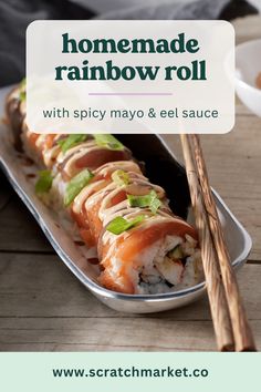 a close up of a plate of food with chopsticks on the side and text overlay reading homemade rainbow roll with spicy mayo & el sauce