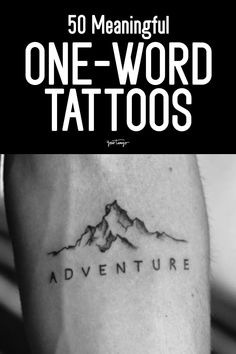 a man's arm with the words one word tattoos on it