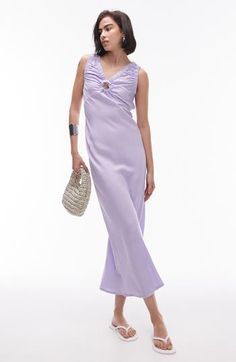 Look gorgeous at brunch in this lilac midi dress cut from lightweight cotton and topped with a keyhole cutout at the neckline. Slips on over head V-neck Sleeveless 100% cotton Machine wash, line dry Imported Lilac Midi Dress, Cocktail Dress Formal, Cotton Midi Dress, Long Sleeve Floral Dress, Satin Slip Dress, Maxi Dress Trend, Key Hole, Dress Cuts, Hoodies For Sale