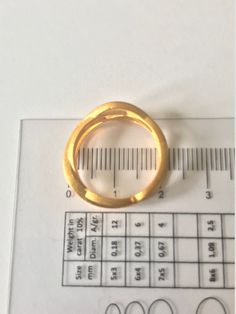 All items are made from 14K Solid Gold. Available Materials 14K Gold 14K Rose Gold 14K White Gold This wavy ring looks like multi band ring. It is a simple but rich looking ring. Ring Wide : 4mm - 8 mm Bands Ticknes : 0.5mm Bands Higest : 1.5mm Gold Round Signet Ring With Tension Setting, Gold Ring With Tension Setting, Gold Tension Setting Round Band Ring, Gold Rings With Bezel Setting, Gold Hand Forged Round Band Rings, Gold Hand Forged Diamond Ring For Anniversary, Anniversary Gold Hand Forged Diamond Ring, Hand Forged Round Signet Ring For Anniversary, Anniversary Hand Forged Round Signet Ring