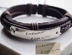 Custom Signature Bracelet, Handwriting jewelry, Handwriting Bracelet, handwriting leather bracelet, handwriting gift, handwriting men gift Stainless steel metal parts with real leather band combined together Actual Handwritten Mens leather bracelets. Memory for mom, dad, grandma, grandpa etc. This is the new object I'd like to do now, the handwritten necklace and handwritting bracelets. I accept any orders with your hand scripts and convert into the handwritten jewelry, like handwritten bracelets or handwritting necklaces. Please kindly send me your script after you placed your order by conversation way. I can custom the orders for you. It can be engraved by front side, inside or both the front & inside sides. Just put your request in the listing page box. The best gifts for Her Birthday, Handwritten Jewelry, Handwritten Necklace, Handwriting Gifts, Handwriting Bracelet, Girlfriend Anniversary Gifts, Custom Signature, Signature Bracelet, Handwriting Jewelry, Leather Anniversary