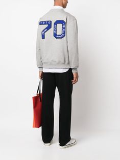 logo-embroidered cotton sweatshirt from KENZO featuring light grey, cotton, embroidered logo to the front, embroidered logo to the rear, crew neck, long sleeves, straight hem and ribbed cuffs and hem. Size Info STANDARD Color Detail Grey Made In Portugal Material Cotton 100% Season One Fall-Winter Season Two Fall-Winter Product sweaters Brand Kenzo Size And Fit This piece fits true to size. We recommend you get your regular sizeModel is 1,84m / 6ft 1in wearing size M Cotton Hoodie With Logo And Crew Neck, Cotton Crew Neck Hoodie With Logo Detail, Cotton Crew Neck Hoodie With Logo, Sporty Cotton Sweater With Logo Detail, Sporty Long Sleeve Sweater With Logo, Sporty Cotton Sweater With Logo, Logo Cotton Crew Neck Hoodie, Logo Cotton Hoodie With Crew Neck, Sporty Logo Crew Sweater