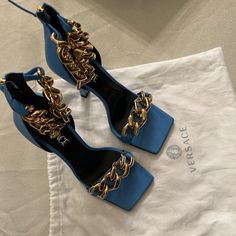 Versace Sandals. Never Worn, Protected Sole. Designer Open Toe Heels With Chain Strap, Luxury Sandals With Chain Strap And Open Heel, Luxury Blue Ankle Strap Heels, Luxury Blue Open Toe Sandals, Blue Luxury Sandals For Formal Occasions, Luxury Sandals With Chain Strap For Summer, Luxury Blue Sandals With Heel Strap, Luxury Blue Open Toe Heels, Designer Blue Sandals For Formal Occasions