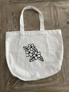 This reusable tote bag is perfect for every occasion! Size: 13.5" x 13.5" x 4" White Softback Canvas Bag For Everyday Use, Large Everyday Canvas Gift Bag, Large Canvas Bag For Daily Use With Dust Bag, Eco-friendly White Canvas Bag With Removable Pouch, Large Canvas Bag For Daily Use, White Canvas Tote Bag With Removable Pouch, White Reusable Shoulder Bag, Large Everyday Reusable Bag, Large Everyday Reusable Bags