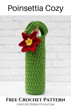 a crocheted green bag with a red flower in it and the text poinsettia cozy