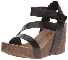 PRICES MAY VARY. MATERIALS: 100% Synthetic Upper INSOLE: Cushioned Footbed for all day comfort ENTRY: Velcro closure for easy on/off and secure fit MOVEMENT: Lightweight and easy to wear wedge sandal for Women STYLE: Comfortable all-day wedge sandal for women Heels Strappy, Comfortable Wedges, Blowfish Shoes, Cork Heels, Sandal Online, High Wedges, Strappy Wedges, Black Wedge, Black Wedge Sandals