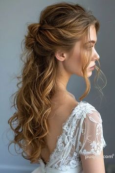 a woman with long hair in a wedding dress looking off to the side, wearing a half - up hairstyle