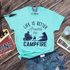 Camping Day Shirt Around Campfire Shirt Matching Camping | Etsy Cotton T-shirt With Funny Print For Outdoor Activities, Cotton T-shirt With Letter Print For Camping, Cotton Camp Shirt With Letter Print For Camping, Pre-shrunk Cotton Camp Shirt For Outdoor Activities, Cotton Camp Shirt With Letter Print For Outdoor, Outdoor Cotton T-shirt With Funny Print, Pre-shrunk Cotton Camp Shirt For Camping, Cotton T-shirt With Funny Print For Outdoor, Cotton Tops With Funny Print For Outdoor Activities