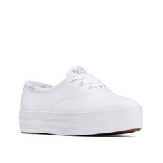 Keds-Point Platform Sneaker - Women's Stylish and chic, the Keds Point platform sneaker brings together two trendy details in one classic silhouette. This sporty pair is elevated by a sleek almond toe and flatform design for a fashionable touch. White Low-top Platform Slip-on Sneakers, Keds Shoes Platform, White Canvas Slip-on Platform Sneakers, Keds Platform Sneakers, White Mid-top Platform Sneakers With Cushioned Footbed, Keds Champion, Platform Sneaker, Chunky Platform, Classic Silhouette