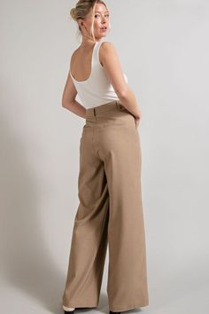 These pleated straight-leg pants are the perfect way to step up your style! Featuring a high waist, these pants will embrace your curves and add a sleek, sophisticated touch to any look. You’ll be strutting in style - no ironing required! Button front closure Side pockets High waistline Belt loops Non-stretchy Non-sheer fabric By eesome USA Size Guide Inseam: S 30.5" M 31" L 31.5 Length: S 42.5" M 43.5" L 44.5" Waist: S 27" M 28" L 29" Hips: 37" M 38" L 39" Our model is 5'8" and is wearing a sma Chic Pants, Flowy Pants, Jet Setter, Pleated Pants, Straight Leg Trousers, China Fashion, Sheer Fabrics, Trouser Pants, Straight Leg Pants