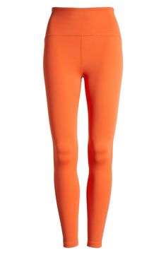 Sleek and stretchy fabric makes these high-waist leggings motion-friendly must-haves for the studio and beyond. 24" inseam; 7 1/2" leg opening; 11 3/4" front rise; 12 1/2" back rise (size Medium) Pull-on style 95% polyester, 5% elastane Machine wash, tumble dry Made in the USA of imported fabric Compression Clothing, Orange Retro, Orange Leggings, Sunset Orange, Cute Leggings, Beyond Yoga, Lululemon Leggings, High Waisted Leggings, Halloween Ideas