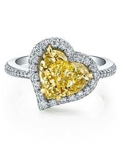 A magnificent yellow diamond engagement ring. Love that heart shaped diamond! Fancy Yellow Engagement Ring, Stylish Engagement Rings, Engagement Season, Yellow Diamond Engagement Ring, Handcrafted Silver Jewelry, Silver Jewellery Online, Yellow Engagement Rings, Fancy Yellow Diamond, Modern Engagement Rings